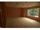 New construction bedroom with stud walls, insulation, and a large window ready to be finished at 4109 Stonewall Dr, Raleigh, NC 27604