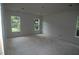 Spacious bedroom with multiple windows allowing for abundant natural light at 4109 Stonewall Dr, Raleigh, NC 27604