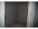 A bare closet is under construction with unfinished floors and newly installed drywall at 4109 Stonewall Dr, Raleigh, NC 27604