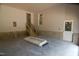 Large garage space with stairs leading to upper level, ready for customization at 4109 Stonewall Dr, Raleigh, NC 27604