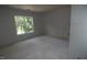 A new construction room features a blank canvas with a window offering natural light and views at 4109 Stonewall Dr, Raleigh, NC 27604
