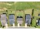Aerial view of a beautiful backyard, featuring a meticulously maintained lawn and patio at 42 Village Walk Dr, Chapel Hill, NC 27517