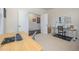 Well-lit bedroom offering a cozy workspace and views into the wider home layout at 42 Village Walk Dr, Chapel Hill, NC 27517