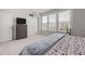 Comfortable bedroom features plush carpet, large windows and a gray dresser, offering a serene and inviting space at 42 Village Walk Dr, Chapel Hill, NC 27517