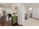 Bright, open interior featuring hardwood floors, ample natural light, and seamless transitions to other rooms at 42 Village Walk Dr, Chapel Hill, NC 27517