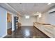 Spacious finished basement with built-in shelving, cabinets, and large window offering natural light at 423 N Cameron St, Hillsborough, NC 27278