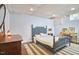 Comfortable bedroom with a plush bed, vintage decor, and a patterned rug at 423 N Cameron St, Hillsborough, NC 27278