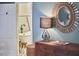 Bedroom view into an elegant bath with freestanding tub and vintage fixtures at 423 N Cameron St, Hillsborough, NC 27278