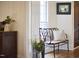 Cozy entryway with a bench, decorative accents, and a view of the home's interior at 423 N Cameron St, Hillsborough, NC 27278