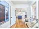 Elegant foyer leading to an open-concept kitchen with an island, seamlessly connecting living spaces at 423 N Cameron St, Hillsborough, NC 27278