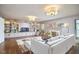 Bright living room with built-in shelves, fireplace, and hardwood floors at 423 N Cameron St, Hillsborough, NC 27278