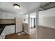 Eat-in kitchen offering white cabinets, appliances, and wood flooring at 441 Cedar St, Henderson, NC 27536