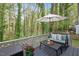 This outdoor deck provides a great setting for relaxation and taking in nature views at 4520 Timberhurst Dr, Raleigh, NC 27612
