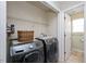 Convenient laundry room with modern washer and dryer units at 4520 Timberhurst Dr, Raleigh, NC 27612