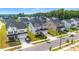 Aerial shot showcases a new neighborhood featuring various home styles and well-maintained landscaping at 5420 Mill Dam Rd, Wake Forest, NC 27587