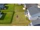 The aerial view captures a expansive backyard space, perfect for outdoor activities and relaxation at 5420 Mill Dam Rd, Wake Forest, NC 27587