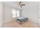 Bright and airy bedroom with a ceiling fan and large window, offering a serene living space at 5420 Mill Dam Rd, Wake Forest, NC 27587