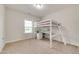 Bright bedroom with a unique loft bed and built-in desk area at 5420 Mill Dam Rd, Wake Forest, NC 27587