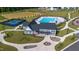 Aerial view showcasing a community center, pool, tennis court, and playground at 5420 Mill Dam Rd, Wake Forest, NC 27587