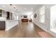 Open floor plan showcasing a modern kitchen flowing into the spacious living area at 5420 Mill Dam Rd, Wake Forest, NC 27587