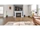 Inviting living room with a fireplace, and light hardwood flooring at 5420 Mill Dam Rd, Wake Forest, NC 27587