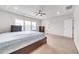 The main bedroom is large with a ceiling fan, carpet, and neutral walls at 5420 Mill Dam Rd, Wake Forest, NC 27587