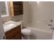 Updated bathroom features a new vanity with granite counters, and a shower-tub combination at 5917 Clearsprings Dr, Wake Forest, NC 27587