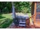 Outdoor hot tub on a wooden deck, perfect for relaxation and enjoying the backyard ambiance at 5917 Clearsprings Dr, Wake Forest, NC 27587
