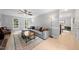 Open living room featuring hardwood floors, neutral tones, and a cozy atmosphere at 6 Weathergreen Ct, Durham, NC 27713