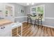 Cozy breakfast nook features a round table, two chairs, and natural light at 6004 Volant Dr, Raleigh, NC 27609