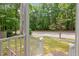 Inviting front porch with view of street and green grass at 6004 Volant Dr, Raleigh, NC 27609
