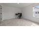 Bright bedroom with a comfortable desk and chair. This room is perfect for an office at 601 Lauren Ann Dr, Apex, NC 27523