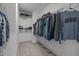 Well-organized walk-in closet with ample hanging space and shelving for efficient storage at 601 Lauren Ann Dr, Apex, NC 27523