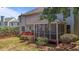 Charming home showcasing a well-maintained backyard, deck, and inviting screened-in porch for outdoor enjoyment at 708 Cheselden Dr, Durham, NC 27713