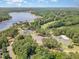 Aerial view of a beautiful community with golf course, tennis courts, pool and lake, offering many amenities at 790 Cashmere Ct, Sanford, NC 27332