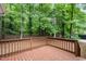 Exterior back deck overlooking wooded backyard at 790 Cashmere Ct, Sanford, NC 27332