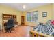 Bedroom with hardwood floors, a day bed, a bookcase, and a large window for ample natural light at 790 Cashmere Ct, Sanford, NC 27332