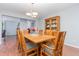 Traditional dining room featuring hardwood floors, wooden table and chairs, and a china cabinet at 790 Cashmere Ct, Sanford, NC 27332