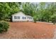 Quaint home with lush, mature trees surrounding a well maintained yard and exterior at 790 Cashmere Ct, Sanford, NC 27332
