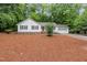 Charming home with a well-manicured lawn, attached garage, and a welcoming front door at 790 Cashmere Ct, Sanford, NC 27332