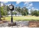 Golf course featuring an ornate clock and lush greenery, providing a scenic backdrop for golfers at 790 Cashmere Ct, Sanford, NC 27332