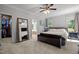 Spacious bedroom with natural light, featuring access to a walk-in closet and Primary bath at 7932 Twin Pines Way, Fuquay Varina, NC 27526