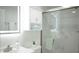 Modern bathroom with glass shower, vanity, and bright, decorative lighting at 800 Pritchard Avenue Ext # H3, Chapel Hill, NC 27516