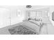 Staged bedroom with neutral tones, a large window, and ample closet space at 800 Pritchard Avenue Ext # H3, Chapel Hill, NC 27516