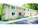 Modern apartment building exterior with neat landscaping and convenient parking at 800 Pritchard Avenue Ext # H3, Chapel Hill, NC 27516
