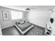 Bedroom with a light grey theme, decor, and a large window with natural light at 800 Pritchard Avenue Ext # H4, Chapel Hill, NC 27516
