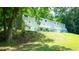 Apartment building with balconies, surrounded by greenery and trees for a peaceful living environment at 800 Pritchard Avenue Ext # H4, Chapel Hill, NC 27516