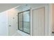 Bathroom with a tub shower featuring glass doors at 8042 Hogan Dr, Wake Forest, NC 27587