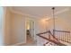 Hallway with stairs, doorway, and closet, offering seamless transition within the home at 8042 Hogan Dr, Wake Forest, NC 27587