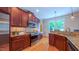 Well-appointed kitchen featuring granite countertops, stainless steel appliances, and warm wood cabinetry at 8042 Hogan Dr, Wake Forest, NC 27587